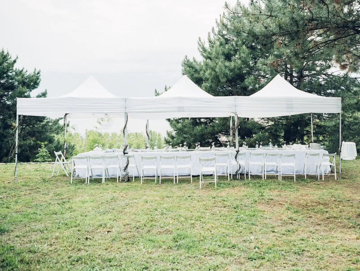 small 3x3 marquee hire wedding reception setup on lawn